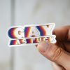 Man holding Gay As Fuck fabulous pride sticker