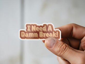 Man holding I Need A Damn Break self-care sticker