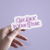 Woman holding I See Dick In Your Future prediction sticker