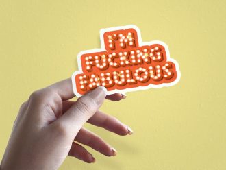 Woman holding I'm Fucking Fabulous empowerment sticker