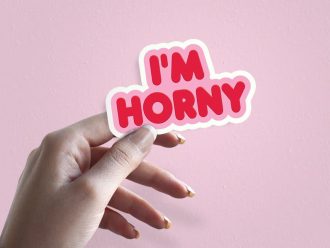 Woman holding I'm Horny frisky romantic sticker