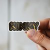 Man holding Kinky sexy adult sticker