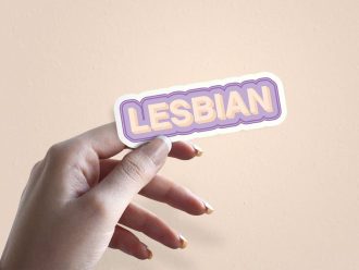 Woman holding Lesbian rainbow pride sticker