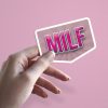 Woman holding MILF Mother's Day sticker