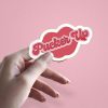 Woman holding Pucker Up couples love sticker