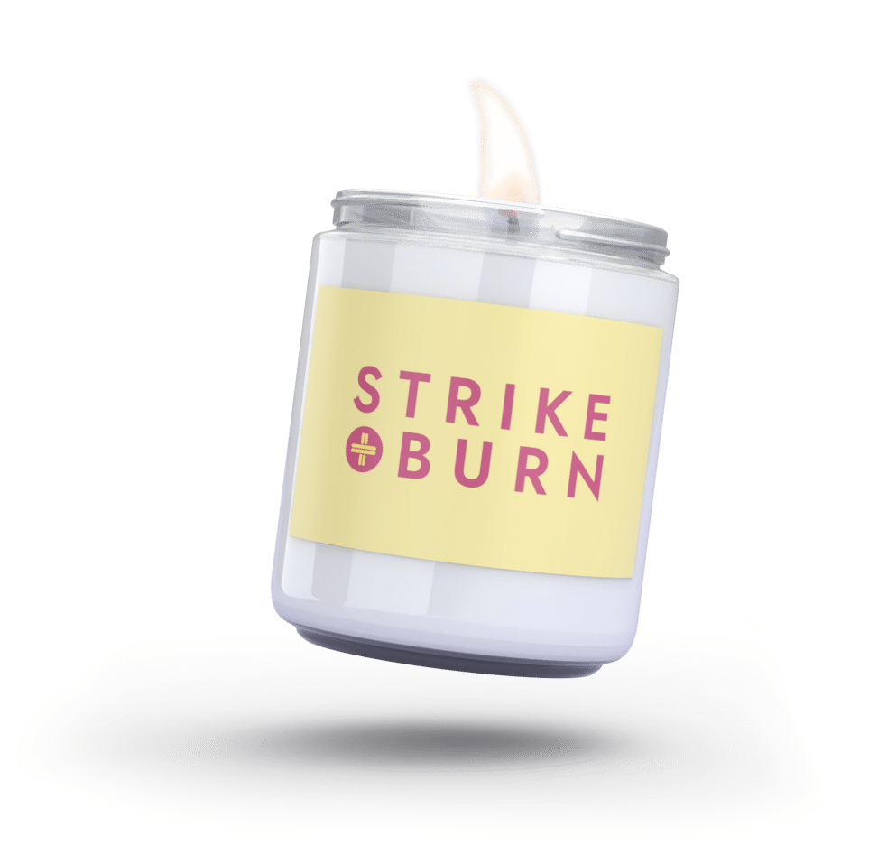 Strike and Burn Flame Candle Jar with yellow label and pink trademark text