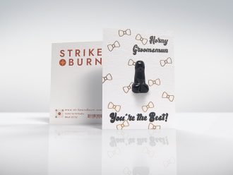 Horny Groomsmen funny bachelor party card with removable crystal penis and gold foil bowties shown front and back on colorful background