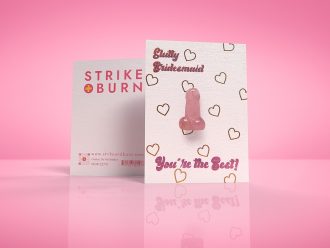 Slutty Bridesmaid funny bridal party card with removable crystal penis and gold foil hearts shown front and back on colorful background